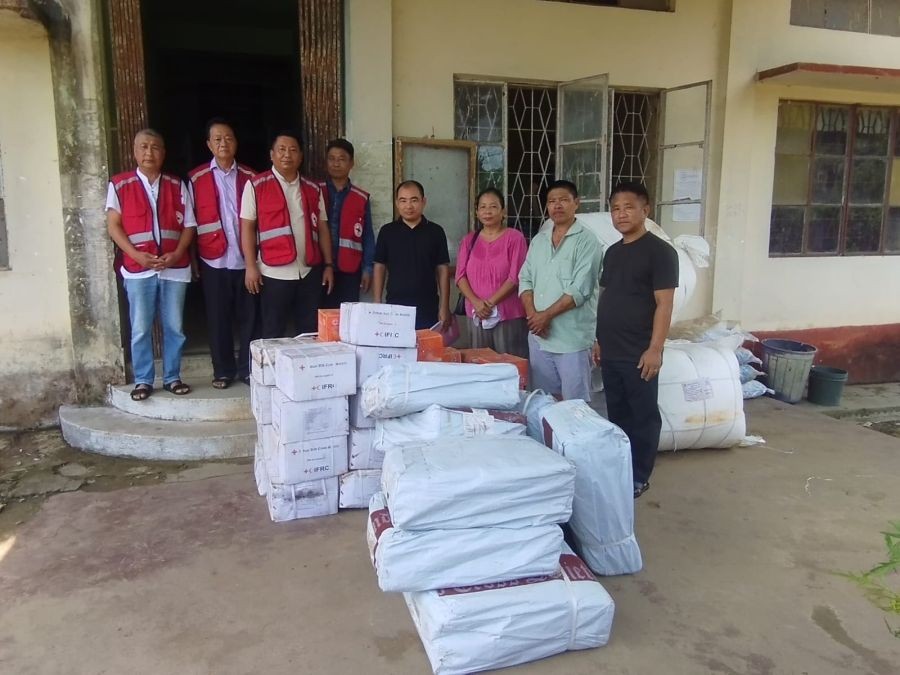 IRCS officials during the distribution of relief materials in Tuli on August 12.